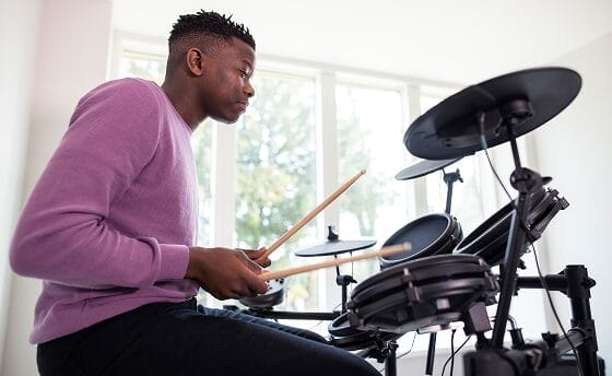 Student with a drums set