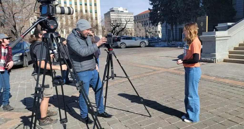 Man with a videocamera