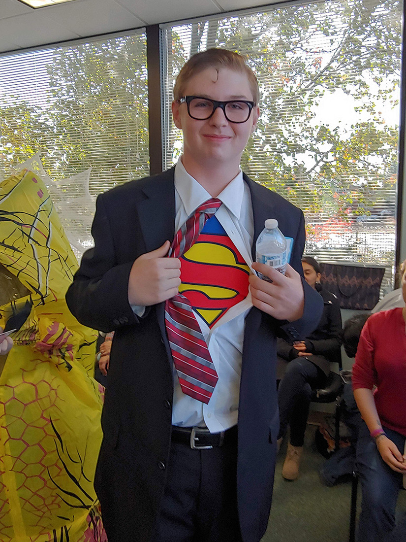 Super Man costumed boy in the fall festival