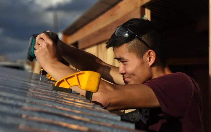 Jonathan doing carpentry work
