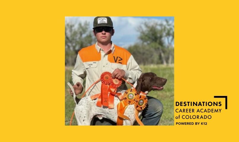 photo of CODCA student Lucas with a dog