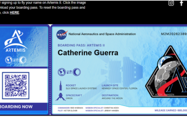 NASA Artemis II boarding pass graphic showing the name Catherine Guerra. The pass includes mission details for a flight around the Moon aboard the Orion spacecraft launched by the Space Launch System (SLS) from Kennedy Space Center, Florida, and displays a QR code and Artemis II mission patch.